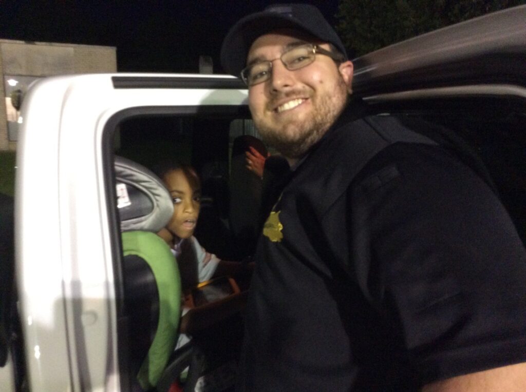 Leroy bringing boxes to flood victim stations at the Celtic Studios Shelter.