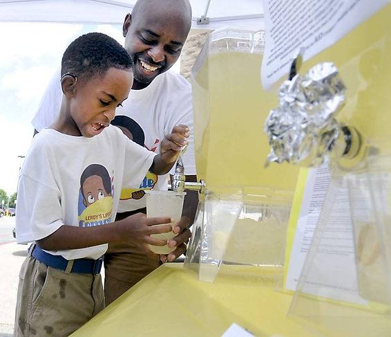 Leroy pouring lemonade