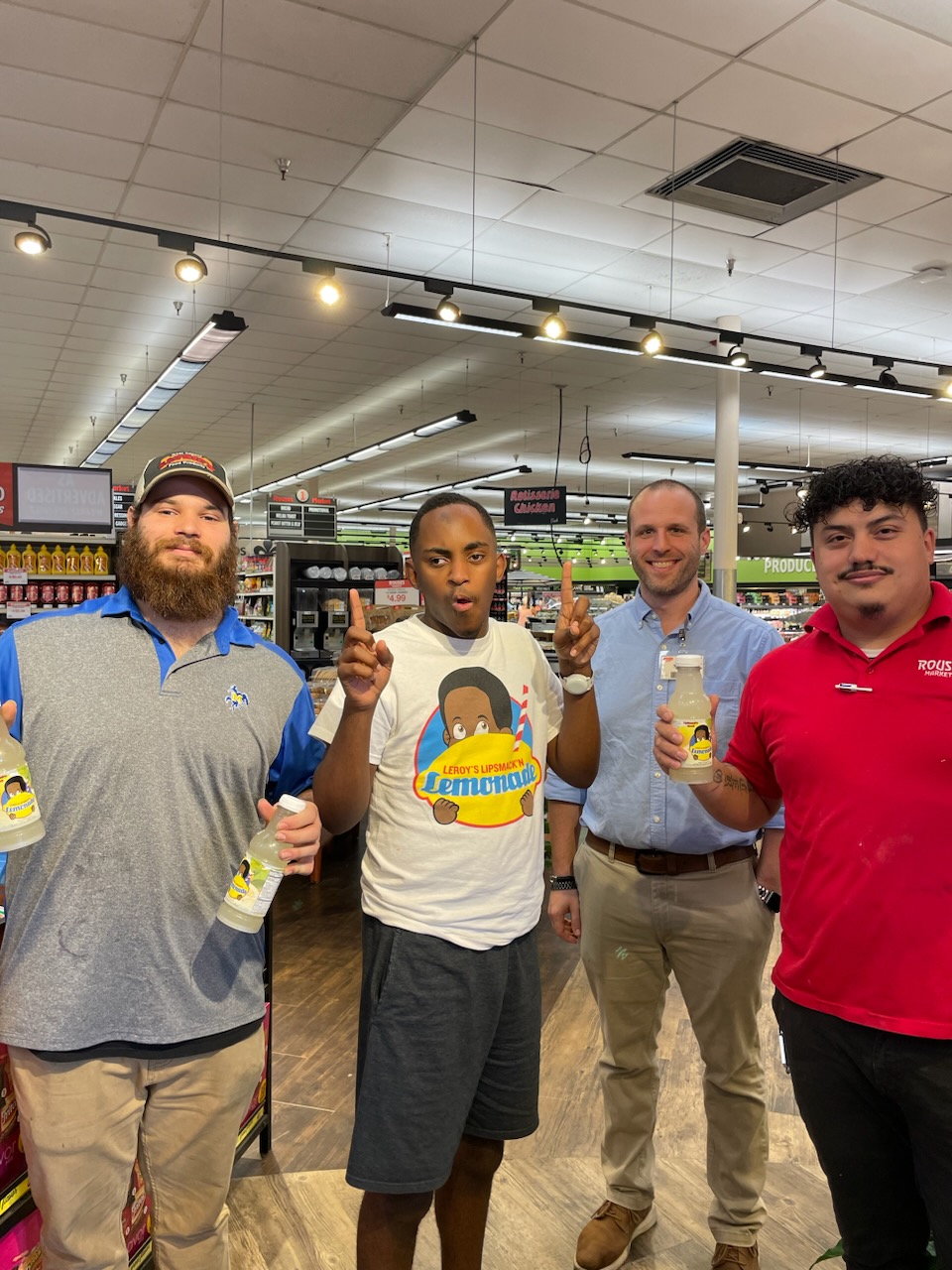 Leroy with staff at Rouses in Ponchatoula