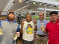 Leroy with staff at Rouses in Ponchatoula