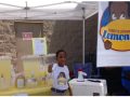 Leroy selling gallons of lemonade in front of Walmart